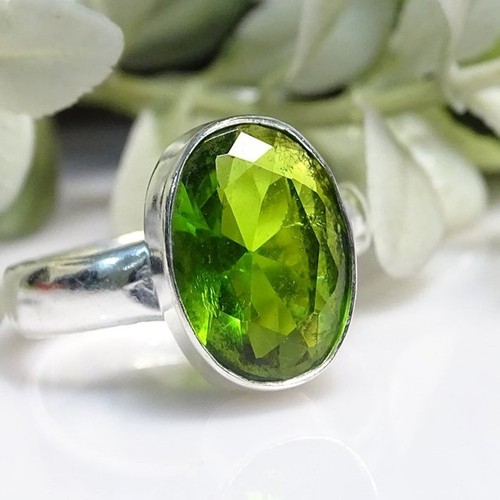 Faceted peridot oval gemstone - faceted,