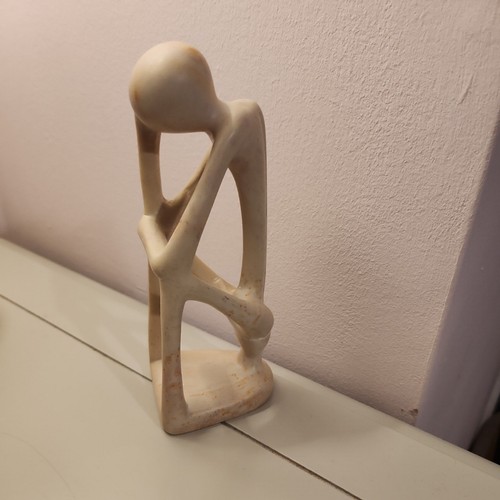 Hand carved soapstone thinking - hand,