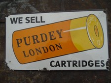 Vintage style We Sell Purdey, London Cartridges enamel advertising sign