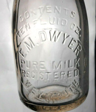 Scarce milk bottle em - oz,