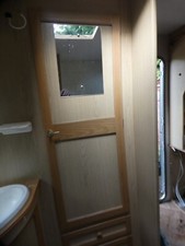 Caravan wardrobe door