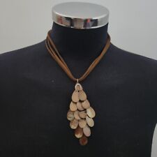 brown abstract pendant on brown string costume jewllery boho