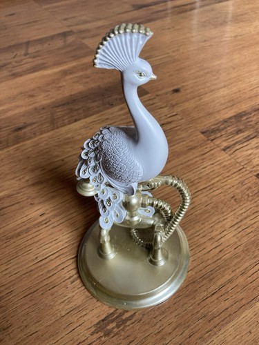 Next white benedict - next, peacock