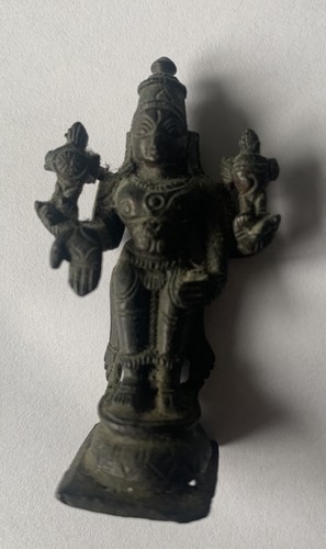 Antique bronze statue