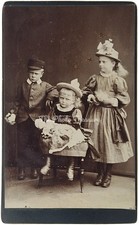 CDV LOVELY VICTORIAN CHILDREN FAMILY GROUP WITH LARGE DOLL TOYS STUDIO PORTRAIT