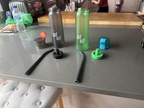 Two air bottles green and - bottles,