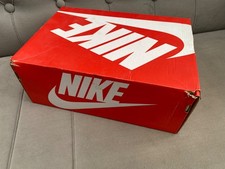 Nike red trainer shoe box