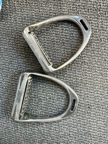 Stirrups and stirrup leathers - and,