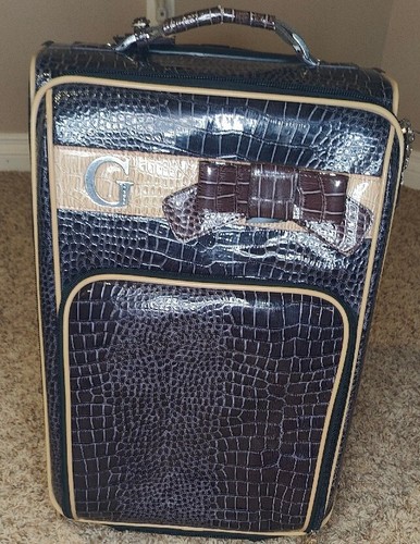 Guess brand carry on - 21”, carry-on