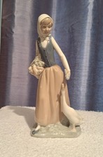 Lladro NAO Fine Porcelain Girl Feeding Goose. In Excellent Condition. No Chips.