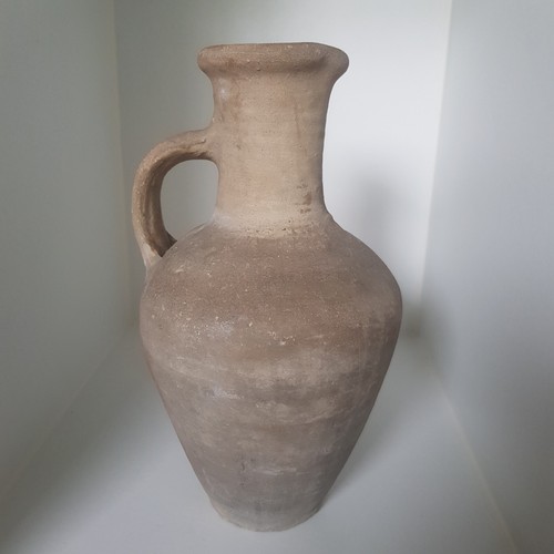 Antique pottery vessel jug