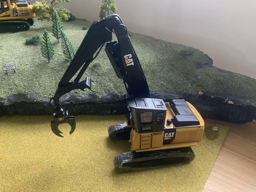 Cat 568ll diecast excavator - 568ll,