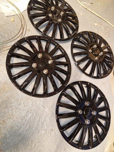 Black wheel trims - 4,