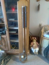 2 antique wood handled golf