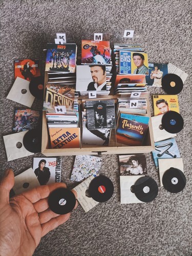 Miniature album with - lp's,