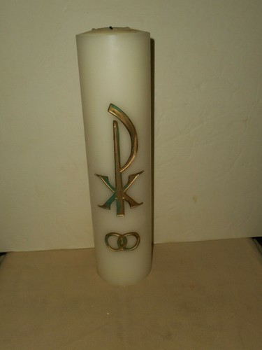 Chi rho church candle for - rho,