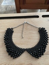 Black beaded statement - black,