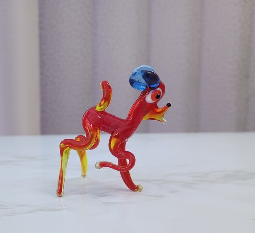 Orange deer figurine hand - figurine,