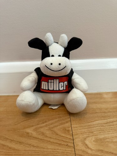 Müller cow mascot - müller,