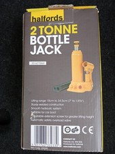 Halfords 2 Tonne Bottle Jack - 'Suitable For Lifting Vehicles Up To 2 Tonnes'.