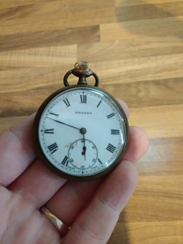 Swiss made brass cased - made,
