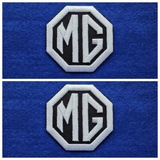 A Pair Of Motor Car Racing