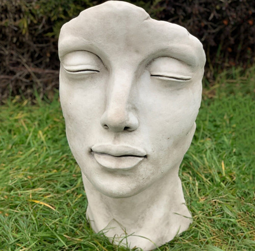 Female face statue - , concrete
