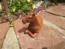 Hand Carved wood netsuke of a