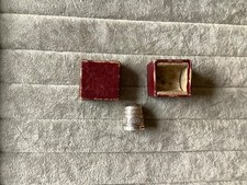 A commemorative silver thimble for ER Coronation