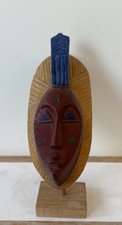 Mask stand carving - mask, on