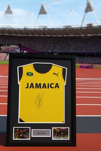 Signed framed usain - framed,