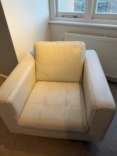 NATUZZI LEATHER ARM CHAIR