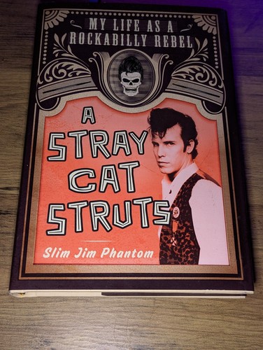 Stray cat struts slim - ",