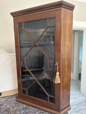 Mahogany Wooden corner cupboard, glazed door with key, two shelves
