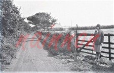 Negative - LADY posing by a  FIVE-BAR GATE to field on a COUNTRY LANE - c 1930's