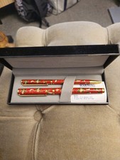 Vintage BOOTS Red Enamel