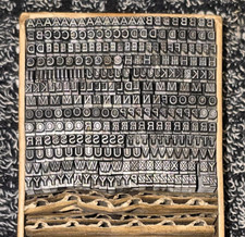 8pt Univers Caps Font Metal