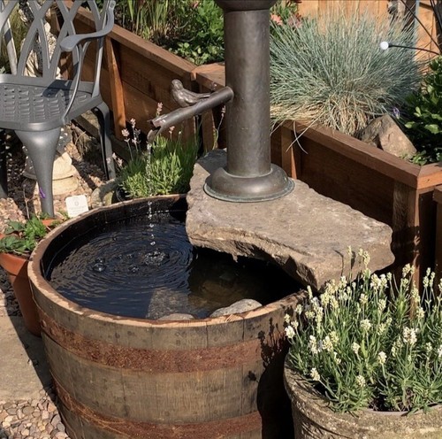 Water tight half whisky barrel - half,