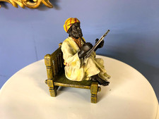 Bronze sculpture of writing