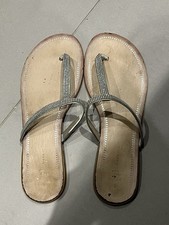 Silver sparkly flip flops toe