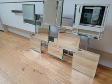 MULTI FACETED MIRROR