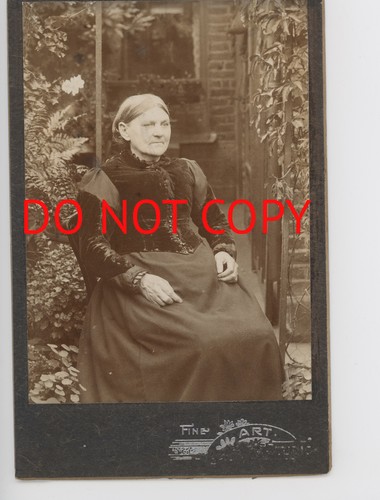 Old woman sitting outside b - woman, a.b
