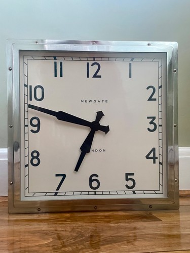 Newgate quad wall - wall, clock