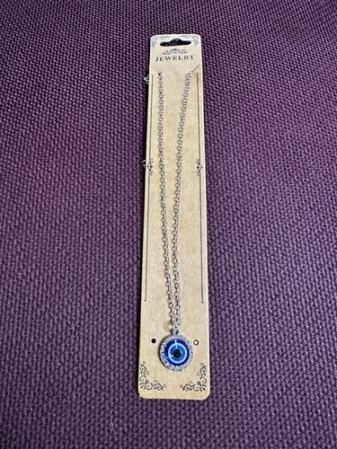 Silver and blue evil eye - and,
