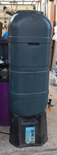 USED WATER BUTT / CONTAINER AND BASE IN VERY GOOD CONDITION £25