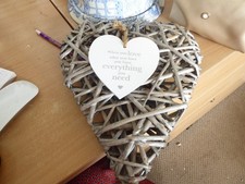 wicker heart with sign  when you love what you have