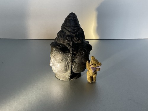 Three headed bronze - three,
