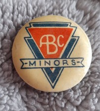 antique ABC Minors badge with old style font