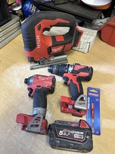 Milwaukee M18 Fuel Jigsaw, Combi Drill, Impact Driver & 5.0ah Battery (5)