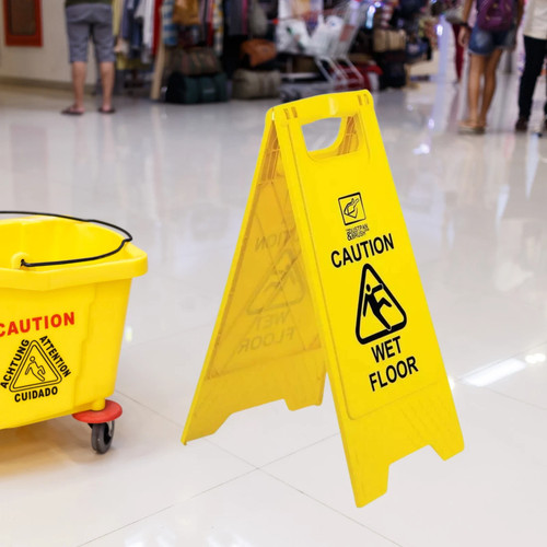 Caution wet floor sign - floor, a
